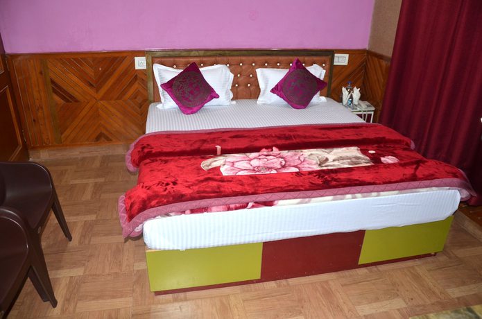Imagen de la habitación del Hotel City Plaza, Dharamsala. Foto 17