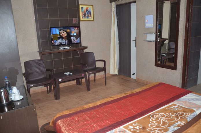 Imagen de la habitación del Hotel City Plaza, Dharamsala. Foto 18