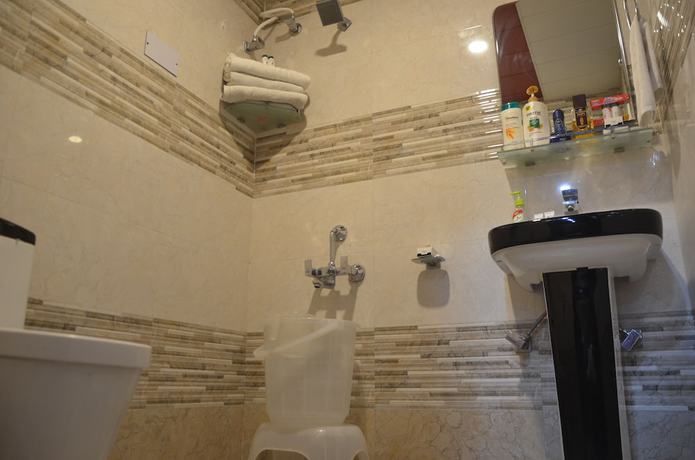 Imagen de la habitación del Hotel City Plaza, Dharamsala. Foto 19