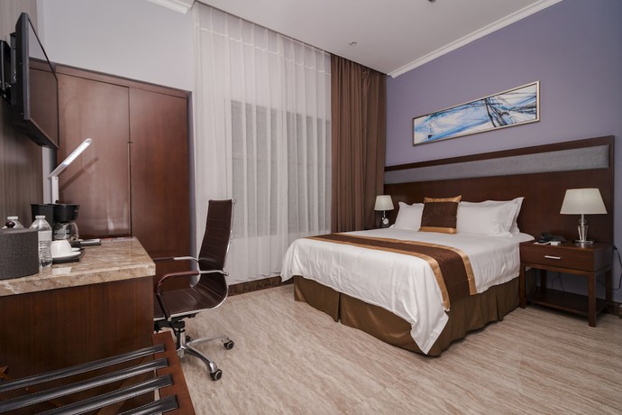 Imagen de la habitación del Hotel City Plaza and Suites. Foto 10