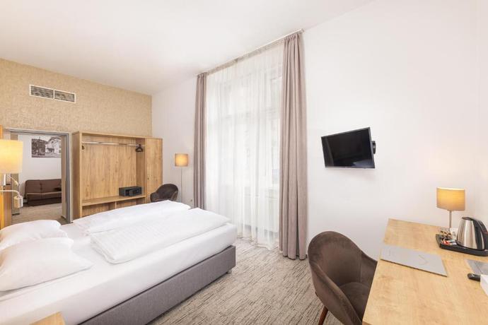 Imagen de la habitación del Hotel City Ring. Foto 5