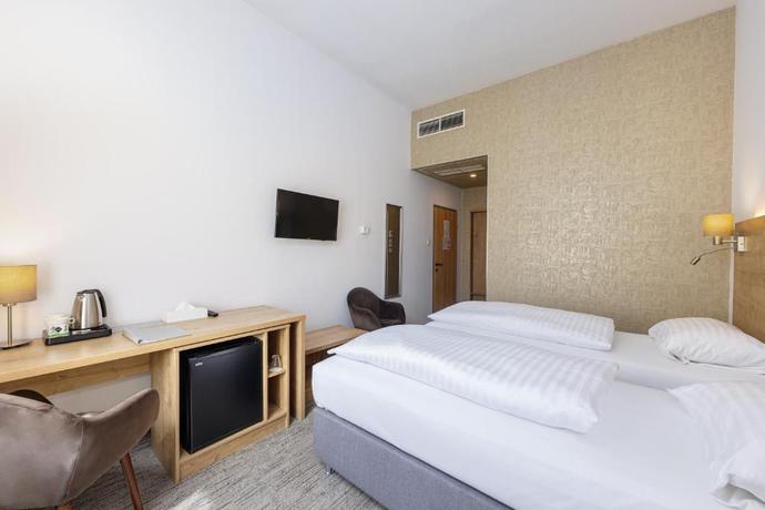 Imagen de la habitación del Hotel City Ring. Foto 6