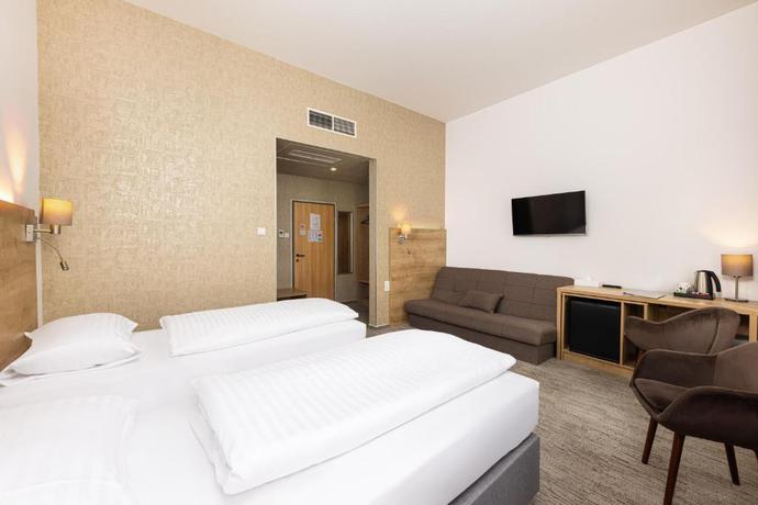 Imagen de la habitación del Hotel City Ring. Foto 9