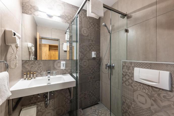 Imagen de la habitación del Hotel City Ring. Foto 10