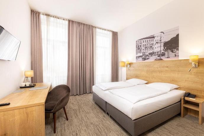 Imagen de la habitación del Hotel City Ring. Foto 12