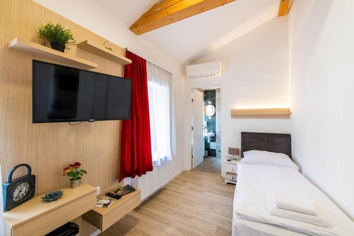 Imagen de la habitación del Hotel City Rooms OS, Osijek. Foto 2
