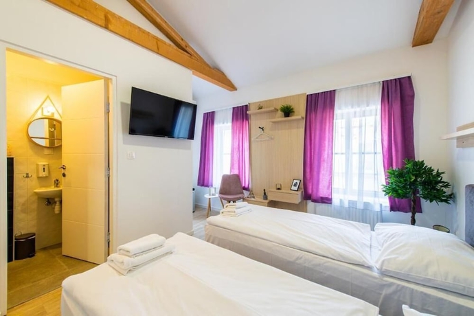 Imagen de la habitación del Hotel City Rooms OS, Osijek. Foto 16