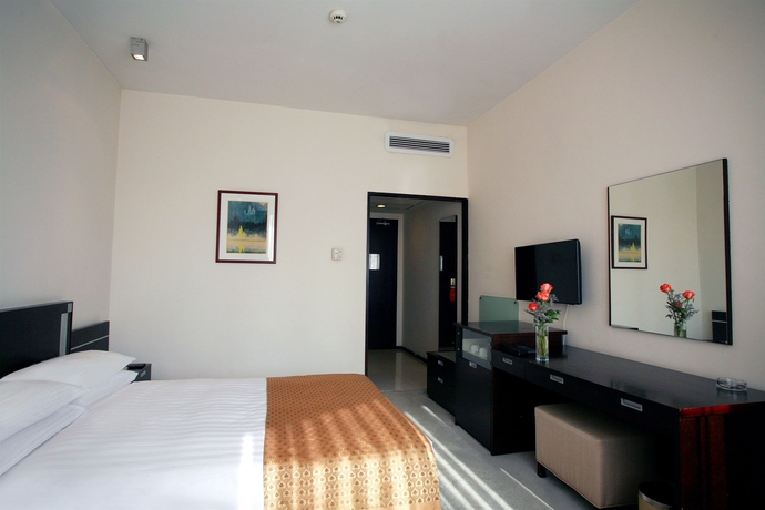 Imagen de la habitación del Hotel City Shanghai. Foto 3