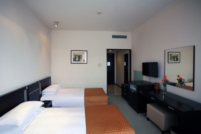 Imagen de la habitación del Hotel City Shanghai. Foto 4