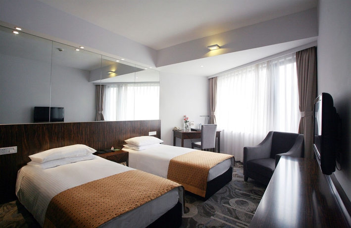 Imagen de la habitación del Hotel City Shanghai. Foto 5