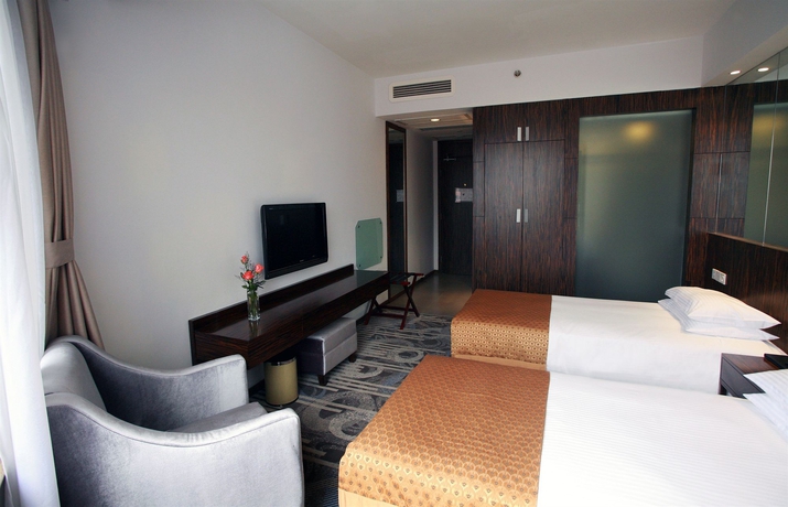 Imagen de la habitación del Hotel City Shanghai. Foto 6