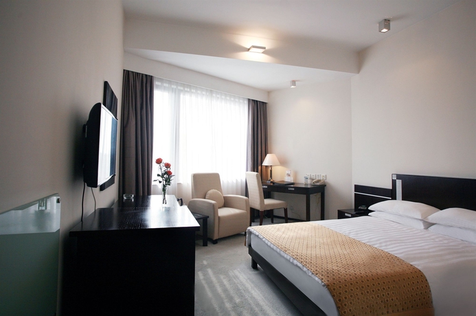 Imagen de la habitación del Hotel City Shanghai. Foto 8