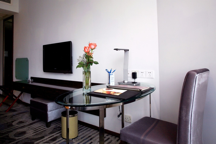 Imagen de la habitación del Hotel City Shanghai. Foto 11