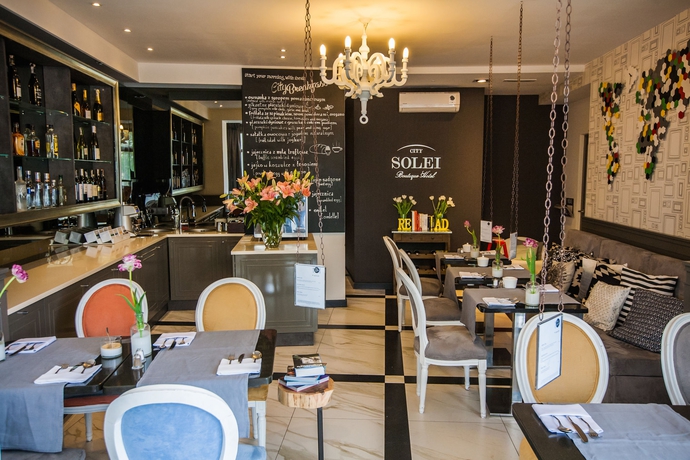 Imagen del bar/restaurante del Hotel City Solei Boutique. Foto 4