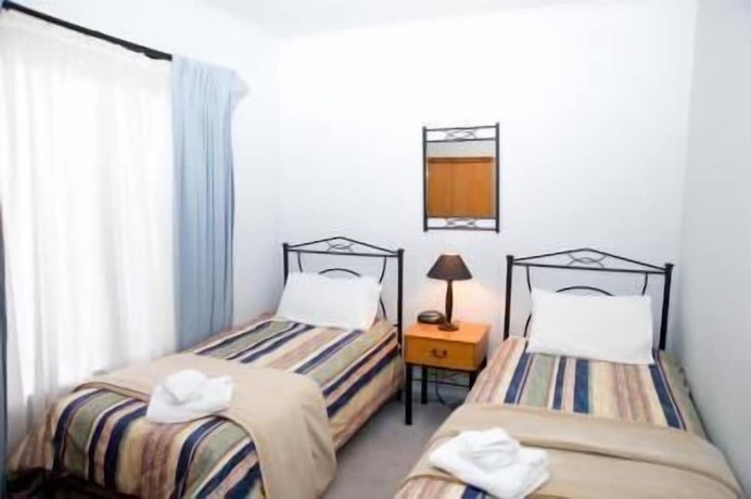 Imagen de la habitación del Hotel City South Apartments. Foto 11