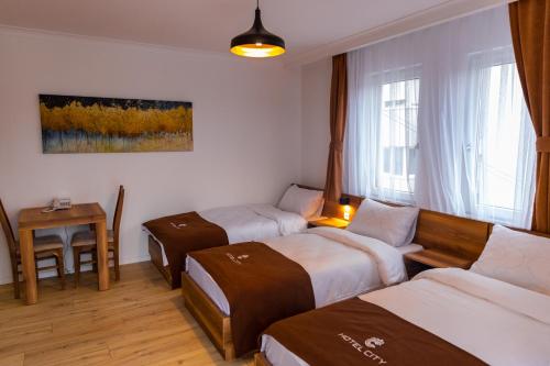 Imagen de la habitación del Hotel City Star, Pristina. Foto 20