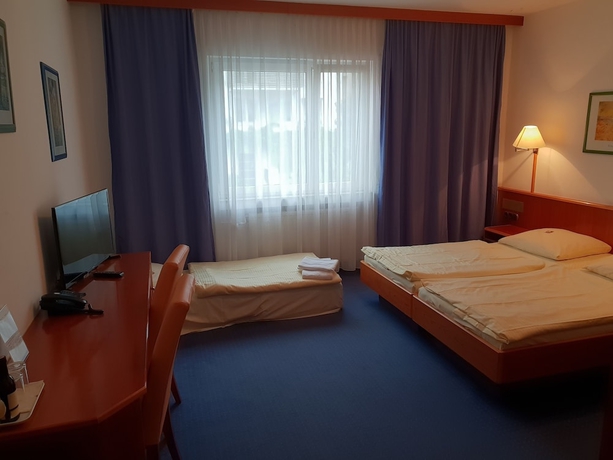 Imagen de la habitación del Hotel City Stuttgart. Foto 2
