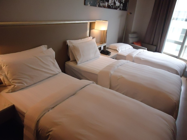 Imagen de la habitación del Hotel City Suites Taipei Nandong. Foto 6