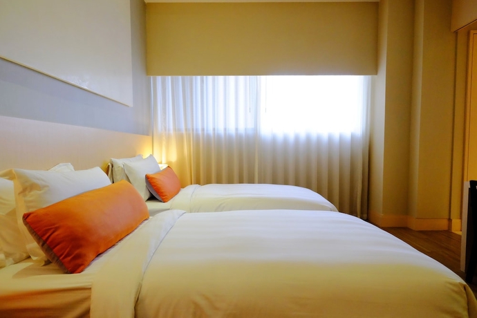 Imagen de la habitación del Hotel City Suites Taipei Nandong. Foto 12