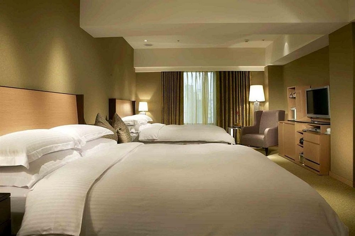 Imagen de la habitación del Hotel City Suites Taipei Nanxi. Foto 4