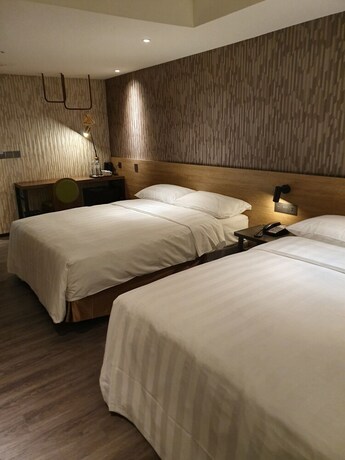 Imagen de la habitación del Hotel City Suites Taoyuan Station. Foto 15