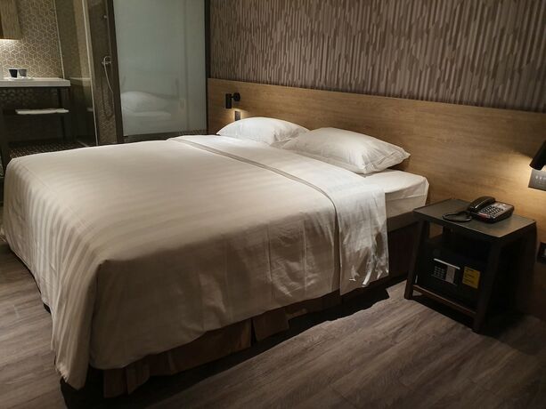 Imagen de la habitación del Hotel City Suites Taoyuan Station. Foto 19