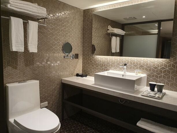 Imagen de la habitación del Hotel City Suites Taoyuan Station. Foto 20