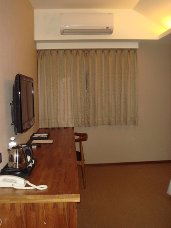 Imagen de la habitación del Hotel City Taipei. Foto 6