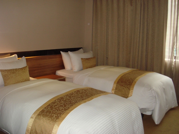 Imagen de la habitación del Hotel City Taipei. Foto 11