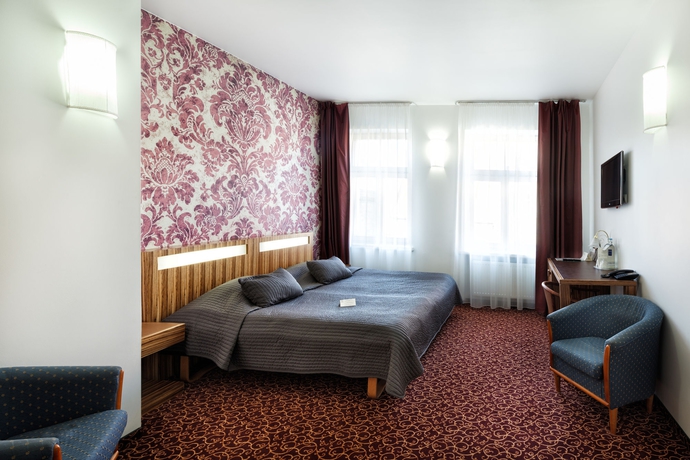 Imagen de la habitación del Hotel City Teater. Foto 11