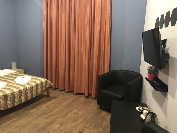 Imagen de la habitación del Hotel City Time. Foto 14