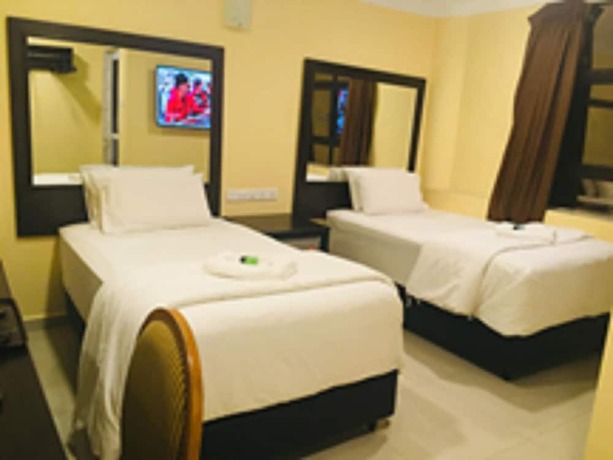 Imagen de la habitación del Hotel City Times Inn 2. Foto 9