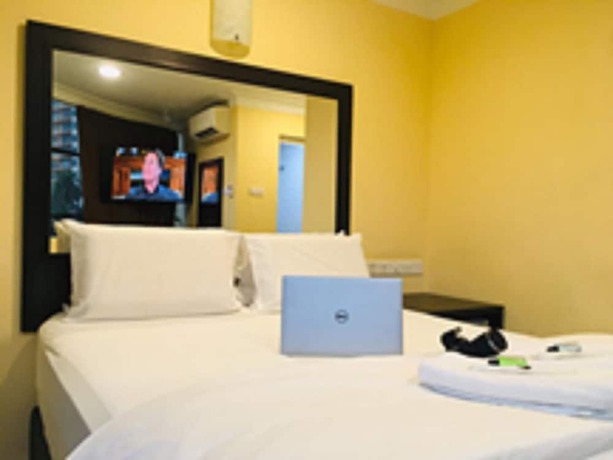 Imagen de la habitación del Hotel City Times Inn 2. Foto 11