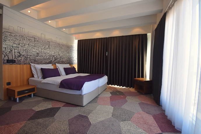 Imagen de la habitación del Hotel City View Deluxe. Foto 6