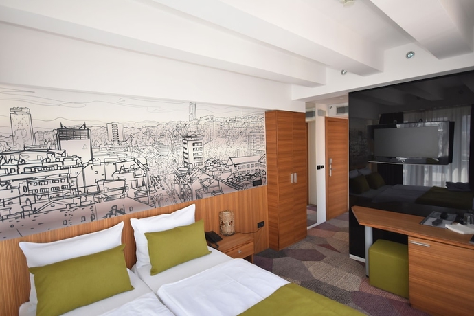 Imagen de la habitación del Hotel City View Deluxe. Foto 7