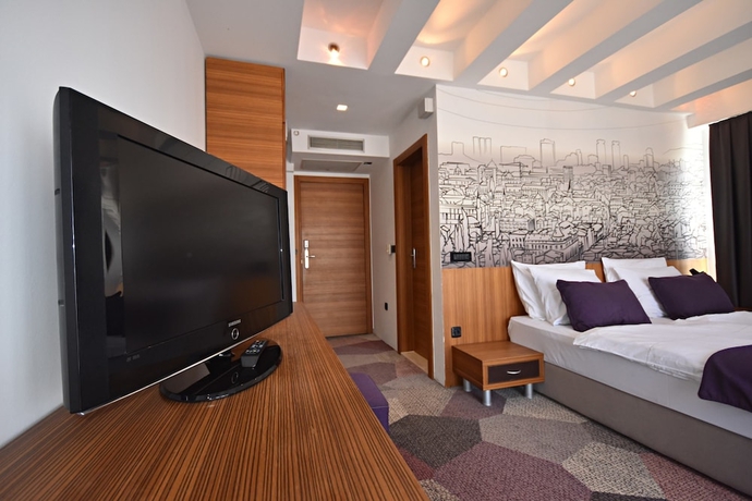 Imagen de la habitación del Hotel City View Deluxe. Foto 9