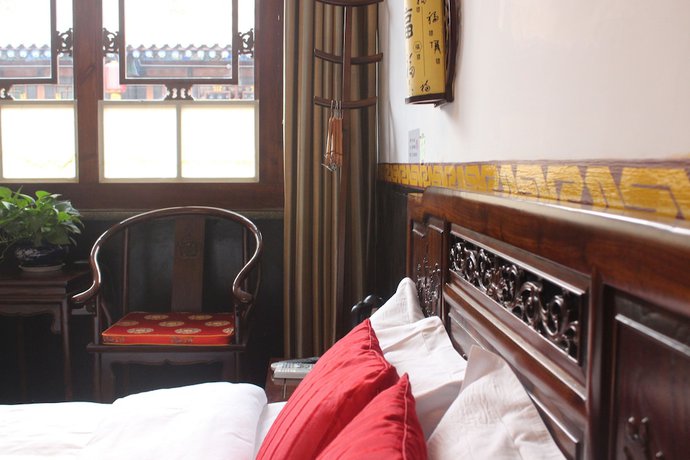 Imagen de la habitación del Hotel City Wall Old House.ji Residence. Foto 4