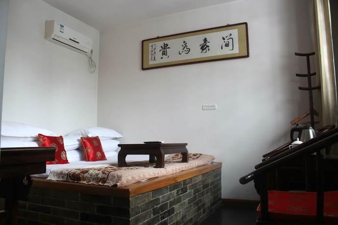 Imagen de la habitación del Hotel City Wall Old House.ji Residence. Foto 10