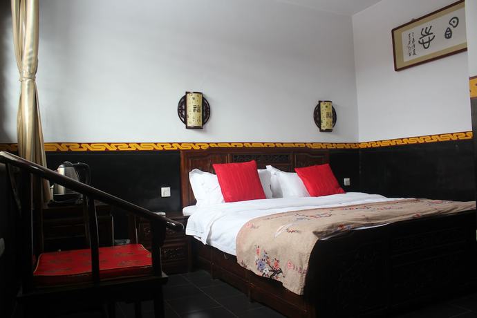 Imagen de la habitación del Hotel City Wall Old House.ji Residence. Foto 11