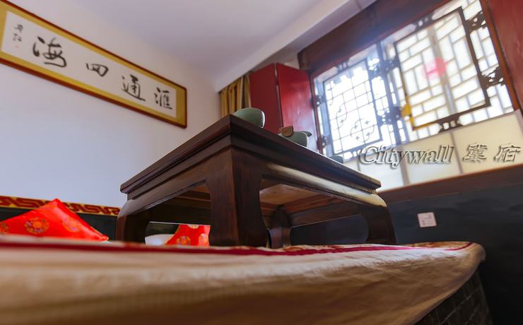 Imagen de la habitación del Hotel City Wall Old House.ji Residence. Foto 16