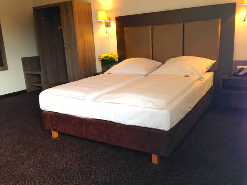 Imagen de la habitación del Hotel City Wiesbaden. Foto 8