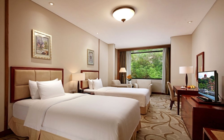 Imagen de la habitación del Hotel City Xiamen. Foto 18