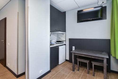 Imagen de la habitación del Hotel City Yard Inn. Foto 11