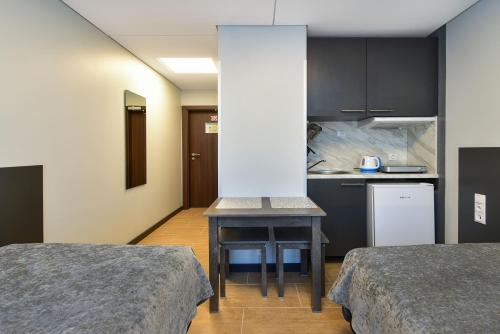 Imagen de la habitación del Hotel City Yard Inn. Foto 13