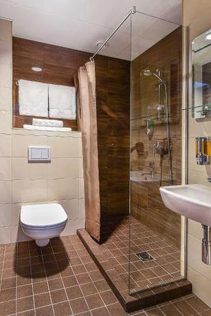 Imagen de la habitación del Hotel City Yard Inn. Foto 15