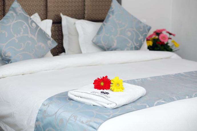 Imagen de la habitación del Hotel City and Suites. Foto 6