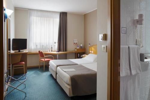 Imagen de la habitación del Hotel City and Suites Foligno. Foto 3