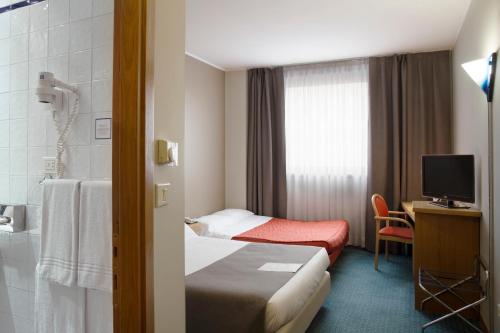 Imagen de la habitación del Hotel City and Suites Foligno. Foto 4