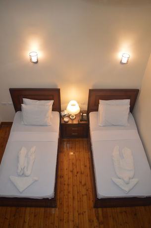 Imagen de la habitación del Hotel City inn hotel. Foto 11