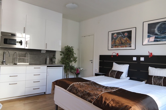Imagen de la habitación del Hotel CityApartment. Foto 4